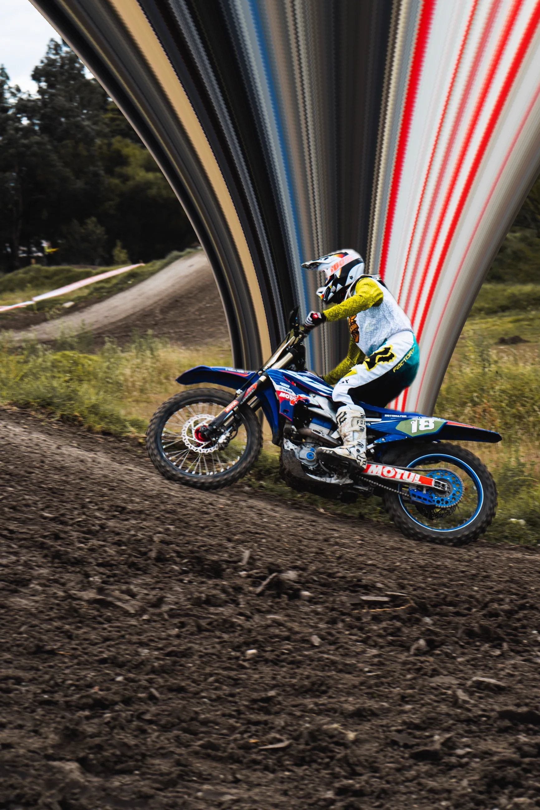 Motorcycle rider with a red and white pixel stretch trail